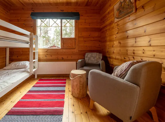 Cosy log cabin living space at Torassieppi